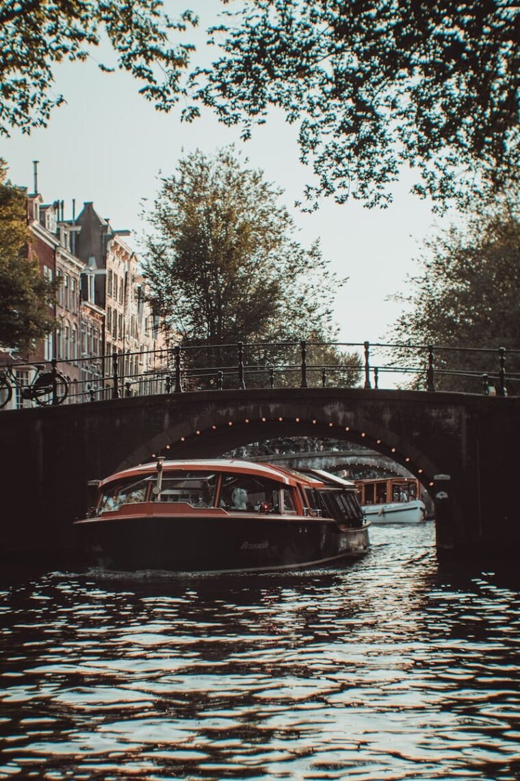 Red Boat Under the Bridge