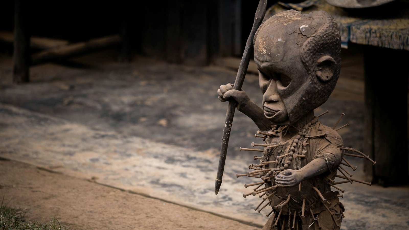 a statue of a man holding a baseball bat