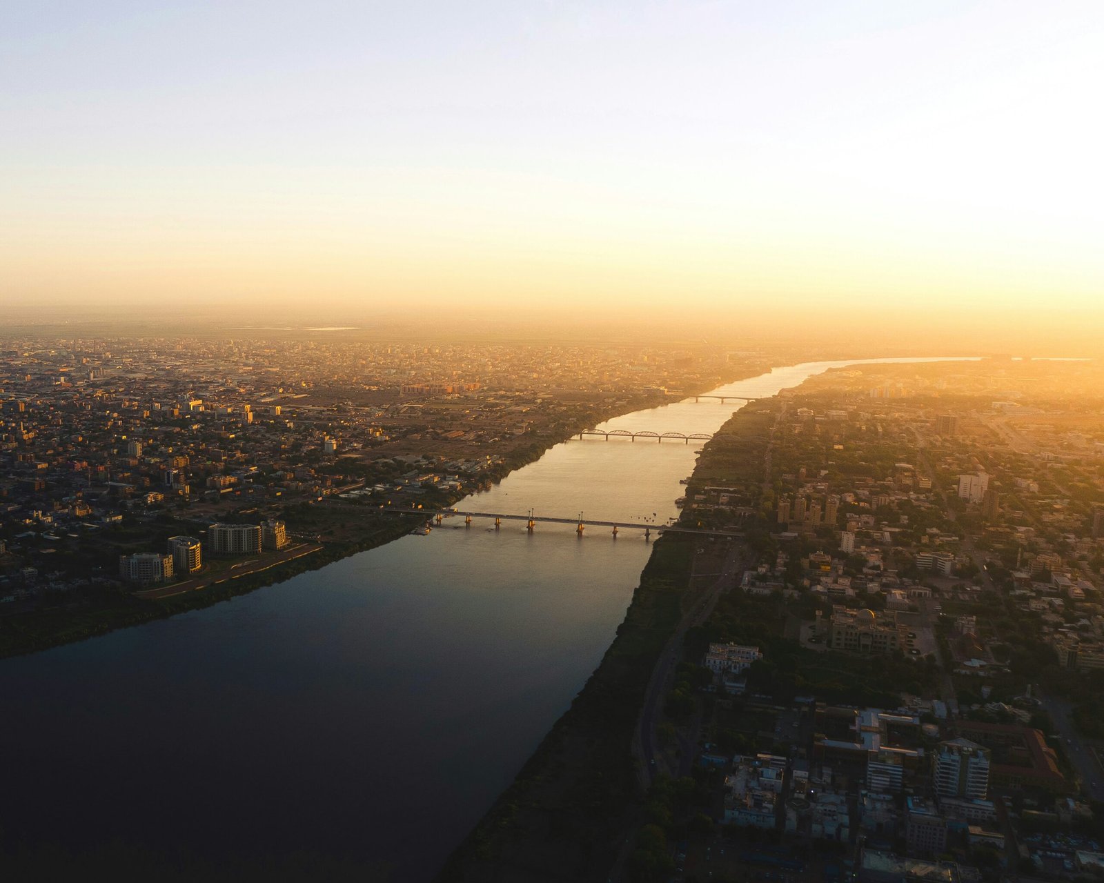 aerial view of city buildings during sunset