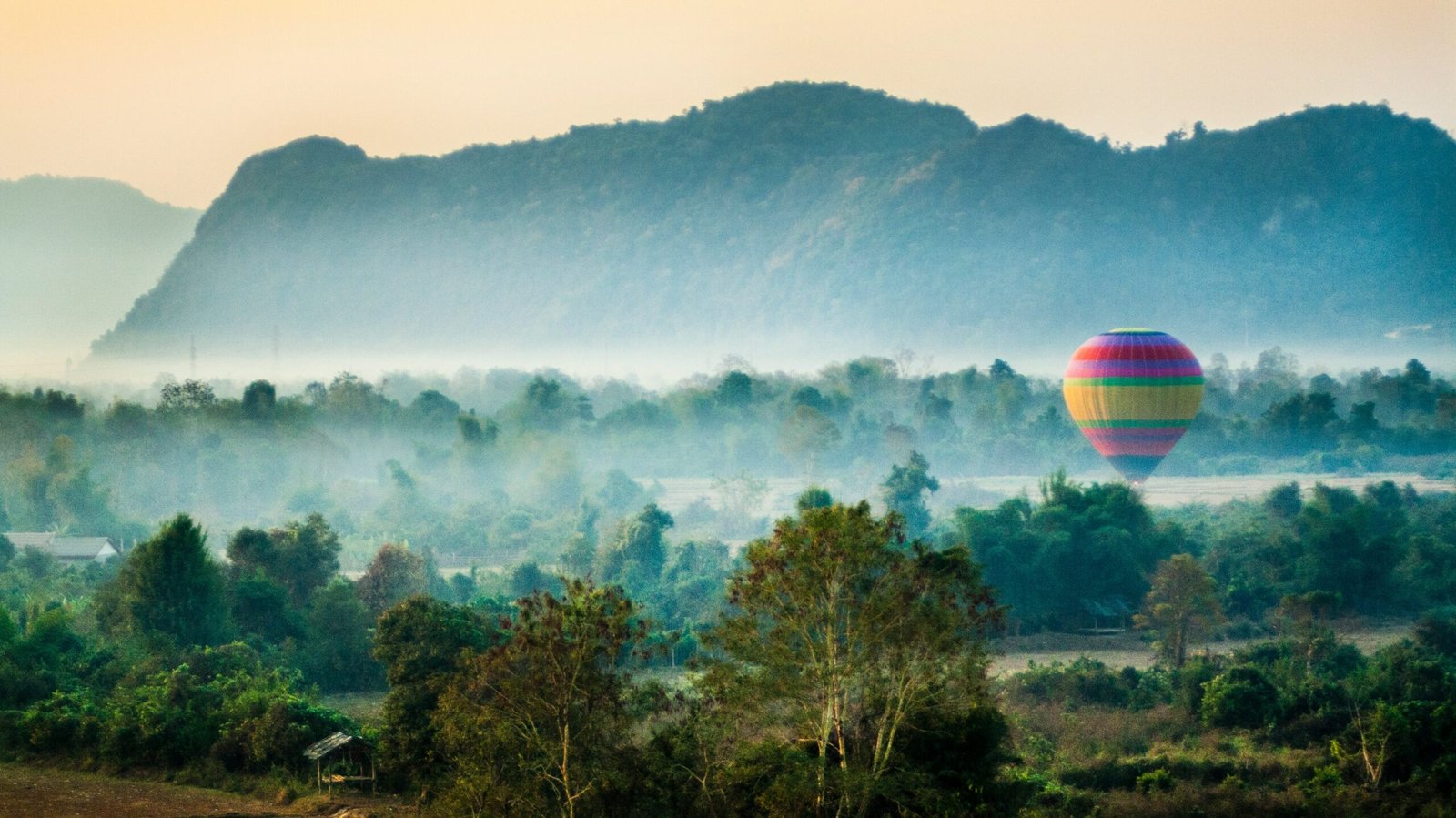 time lapse photography of flying hot air balloon