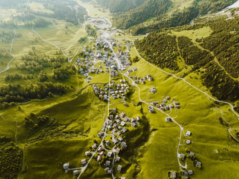 Spectacular aerial view of Malbun village nestled in the lush green mountains of Liechtenstein.