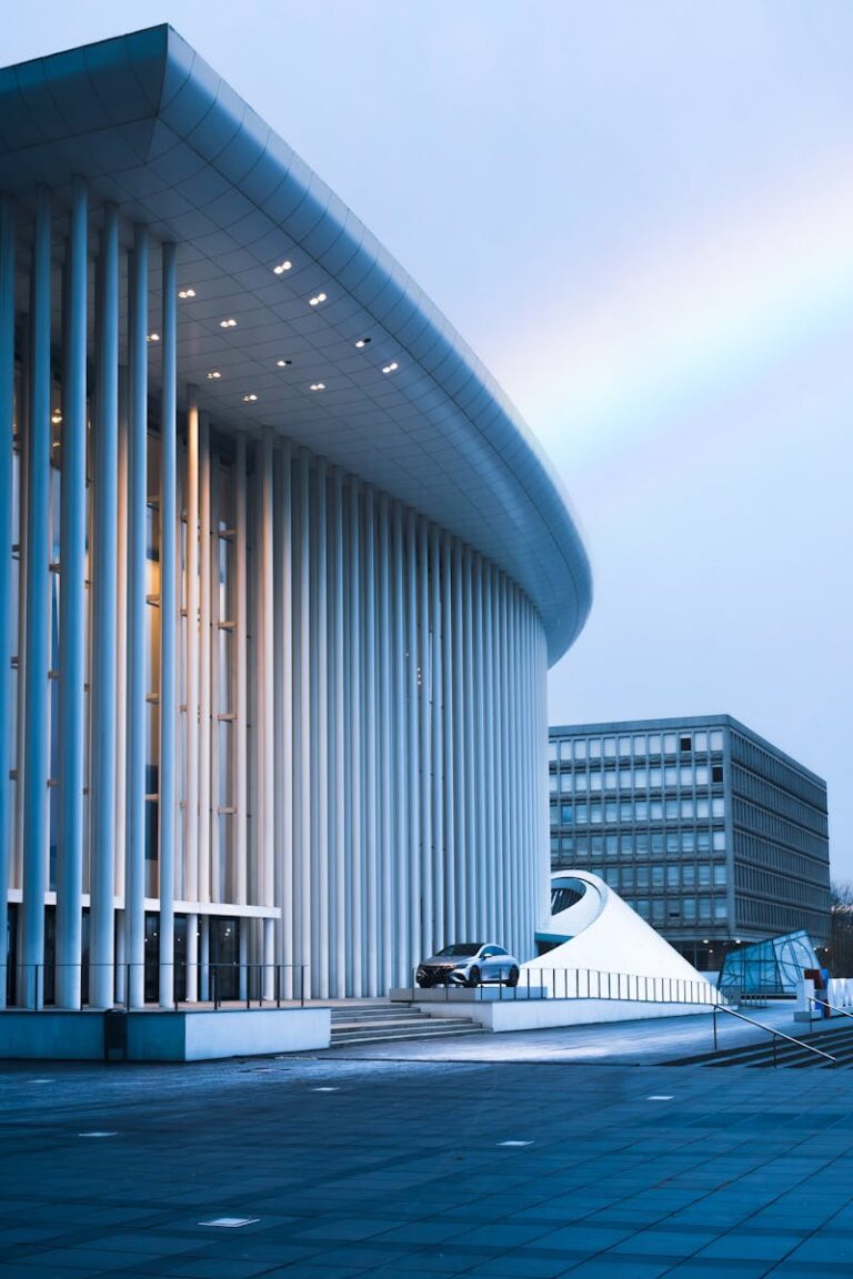 Stunning modern architecture of Philharmonie Luxembourg exterior captured in vibrant daylight.