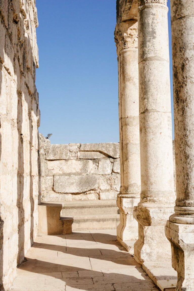 Explore the historic ruins of the ancient synagogue in Capernaum, Israel, showcasing classic stone columns.