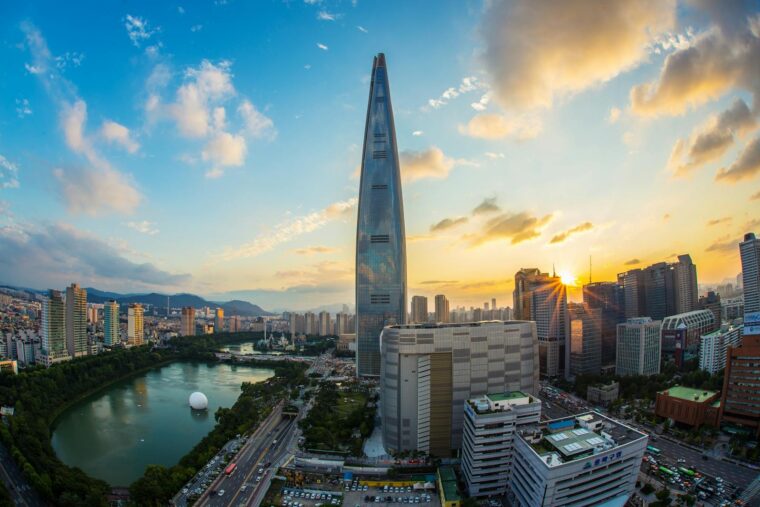 Stunning view of Seoul's skyline featuring Lotte World Tower at sunset.