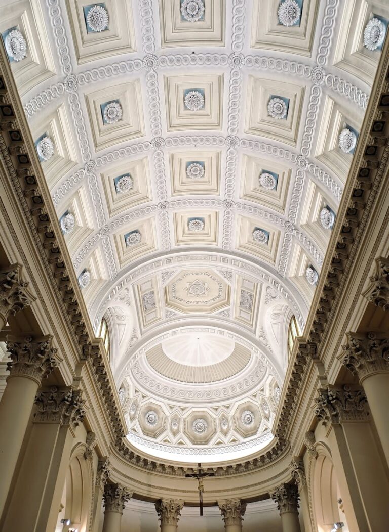 Stunning view of the detailed ornate ceiling in the Basilica of San Marino, showcasing intricate architecture.