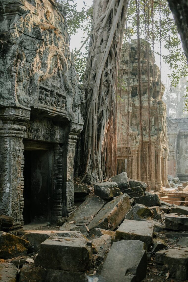 Explore the timeless ruins of Angkor Wat overtaken by nature's embrace.