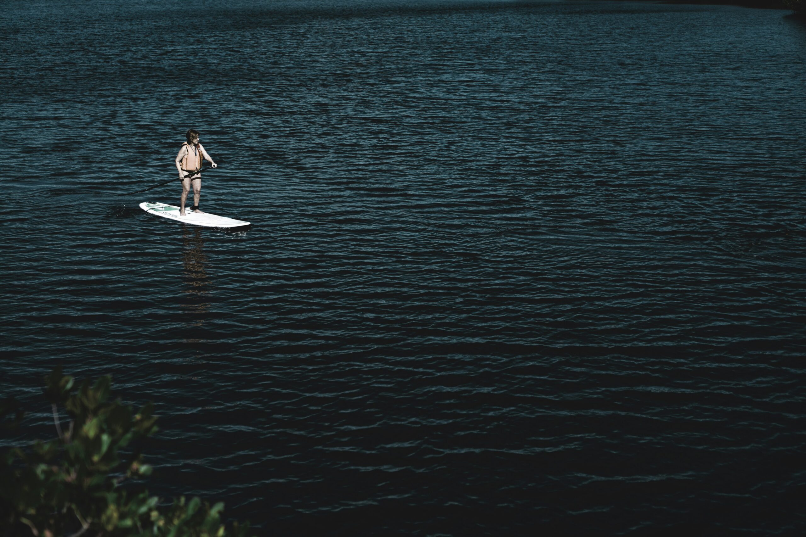 man riding boat at water